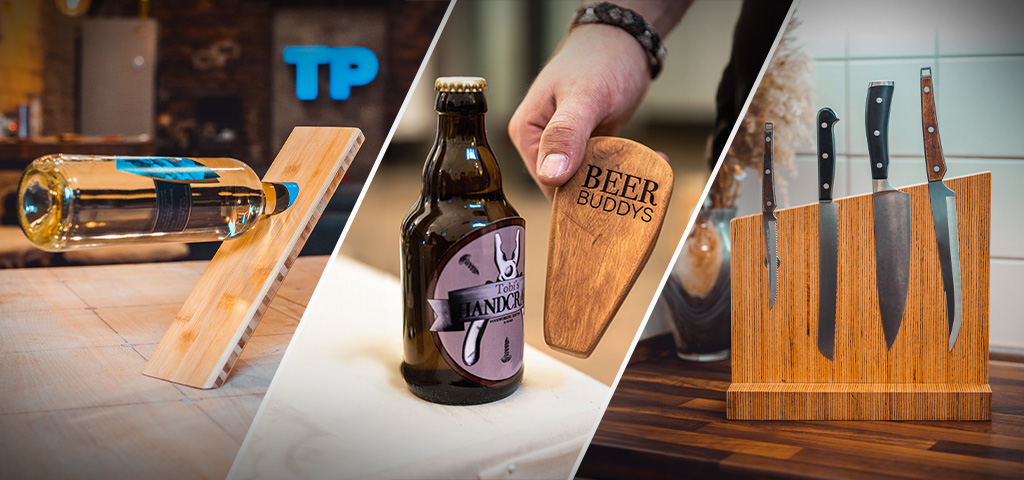 Three wooden products: a slanted wine holder with bottle, an engraved opener with “BEER BUDDYS,” and a knife block with four knives.