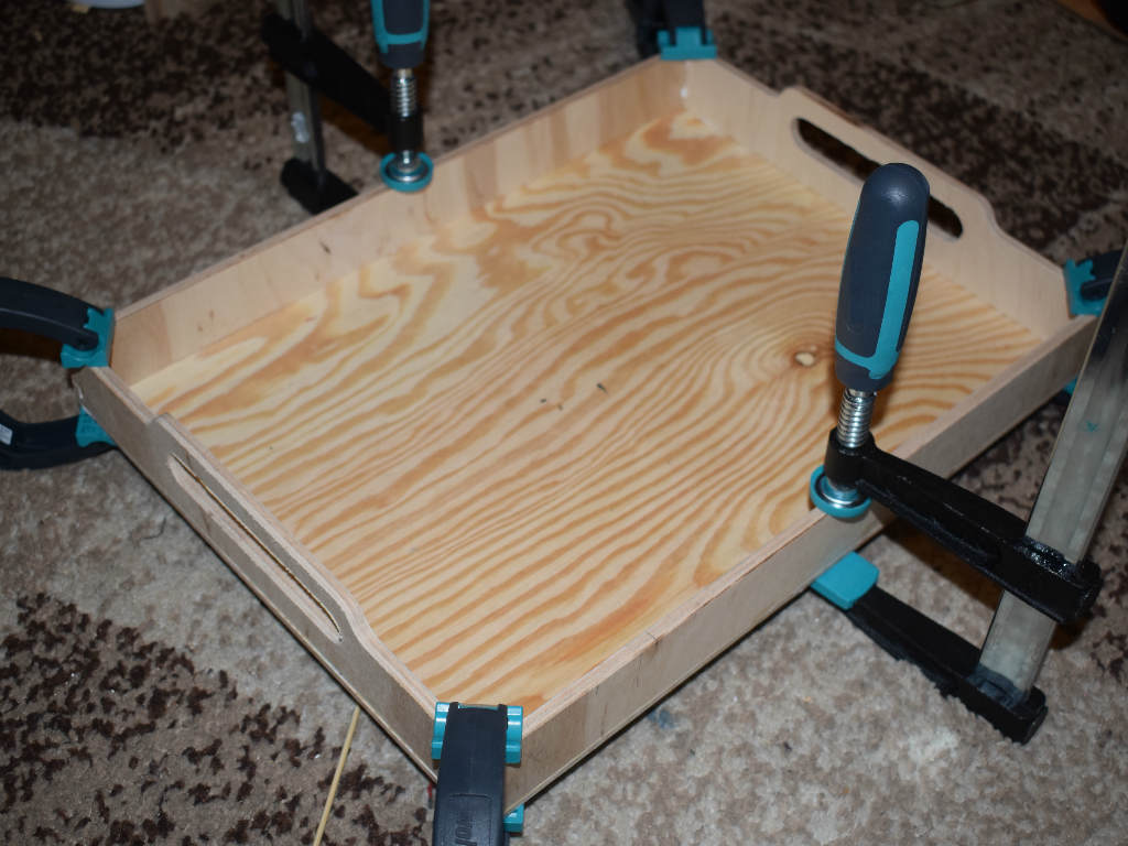 wooden table is clamped together