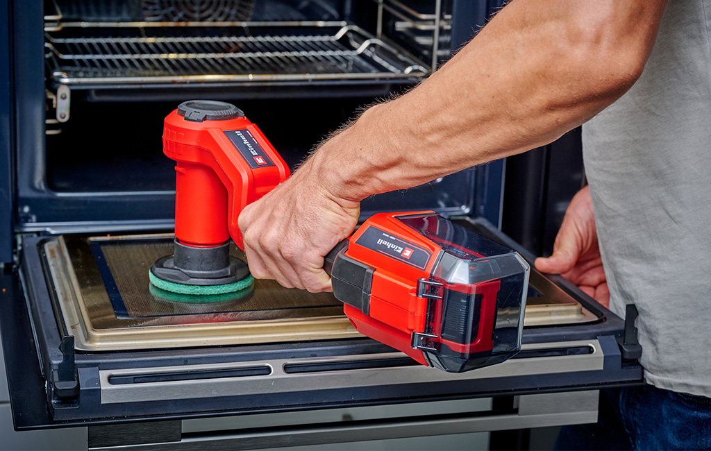 A man using the cordless surface brush.