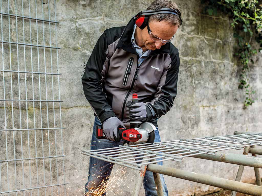 a man bends iron bars