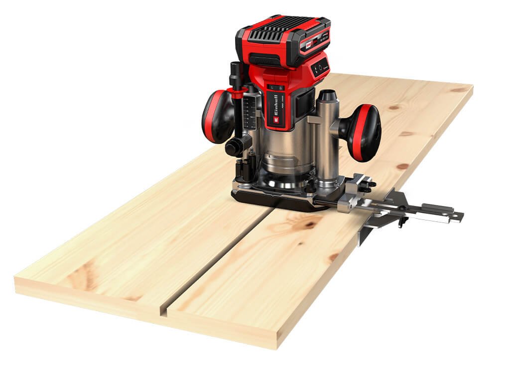 Graphic representation of the cordless router milling a groove in a wooden panel.