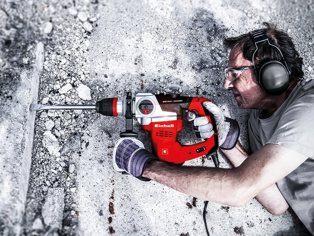 a man destroys a stone