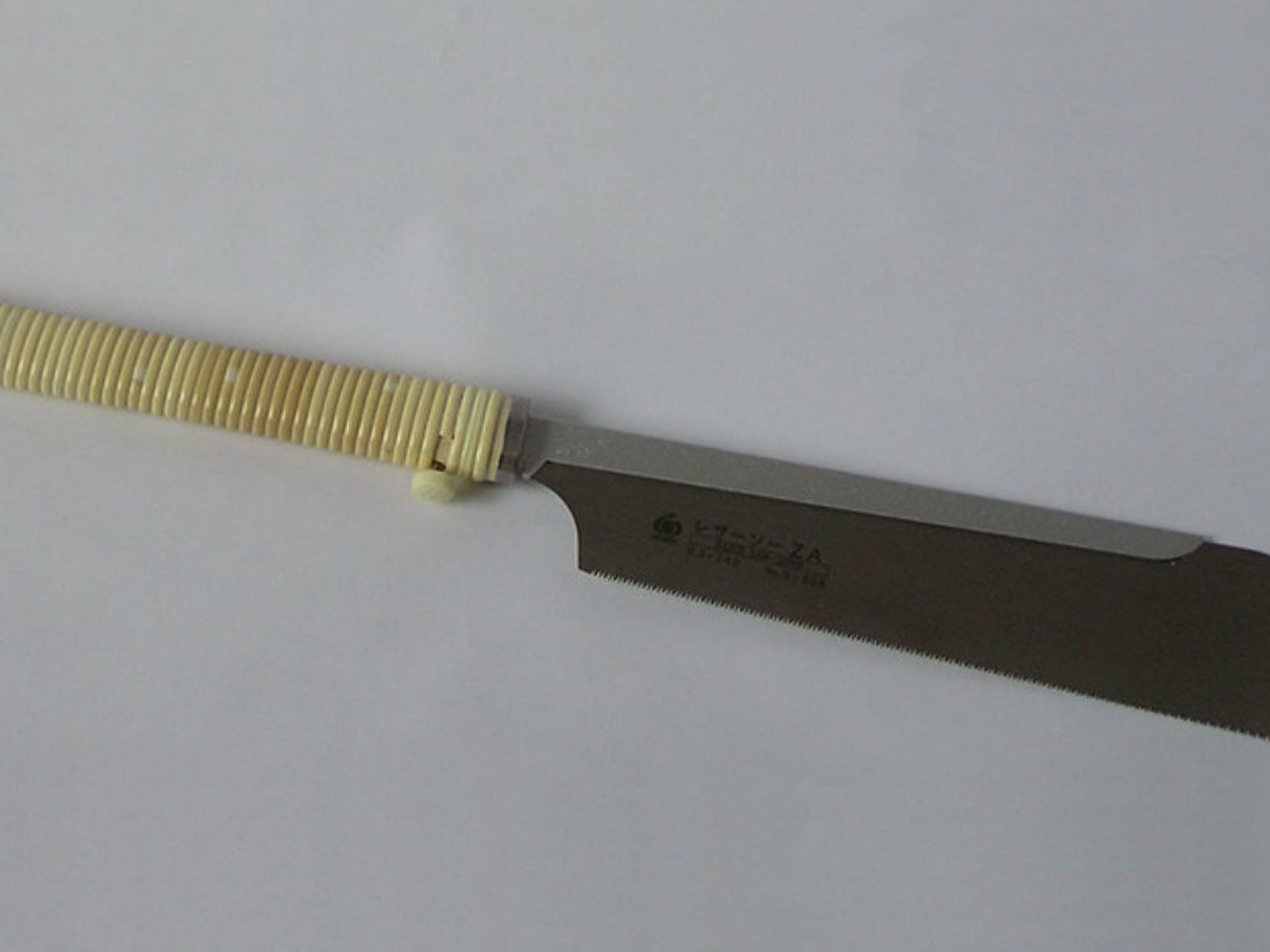 knife with yellow handle