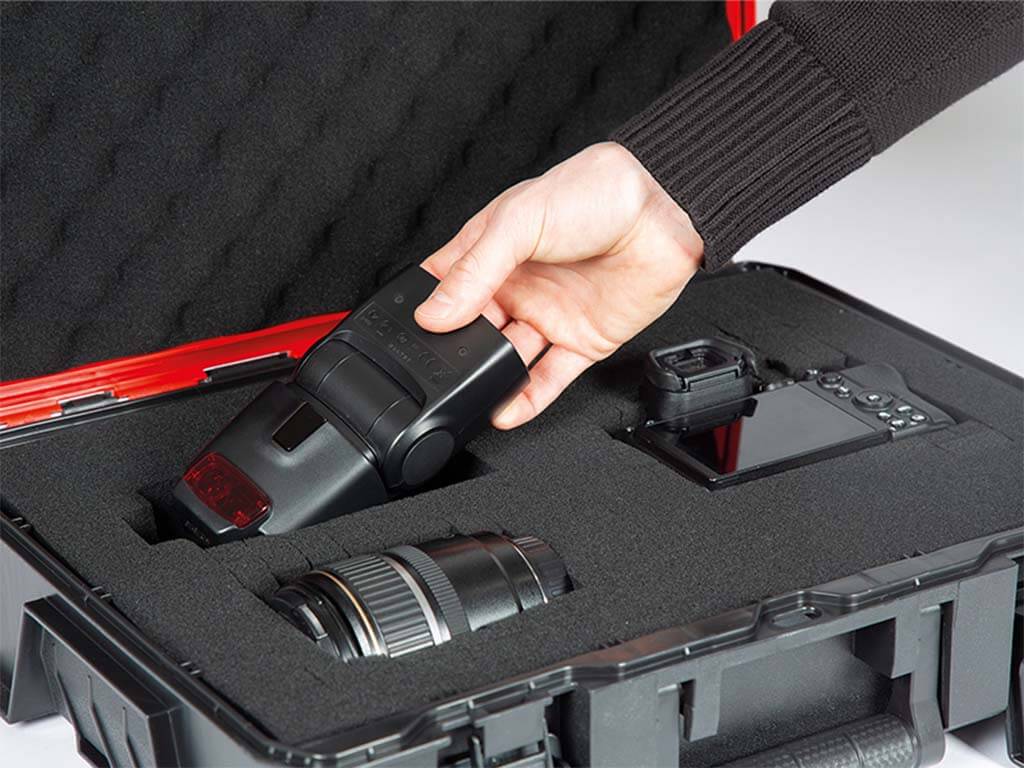 camera equipment ist placed in a suitcase