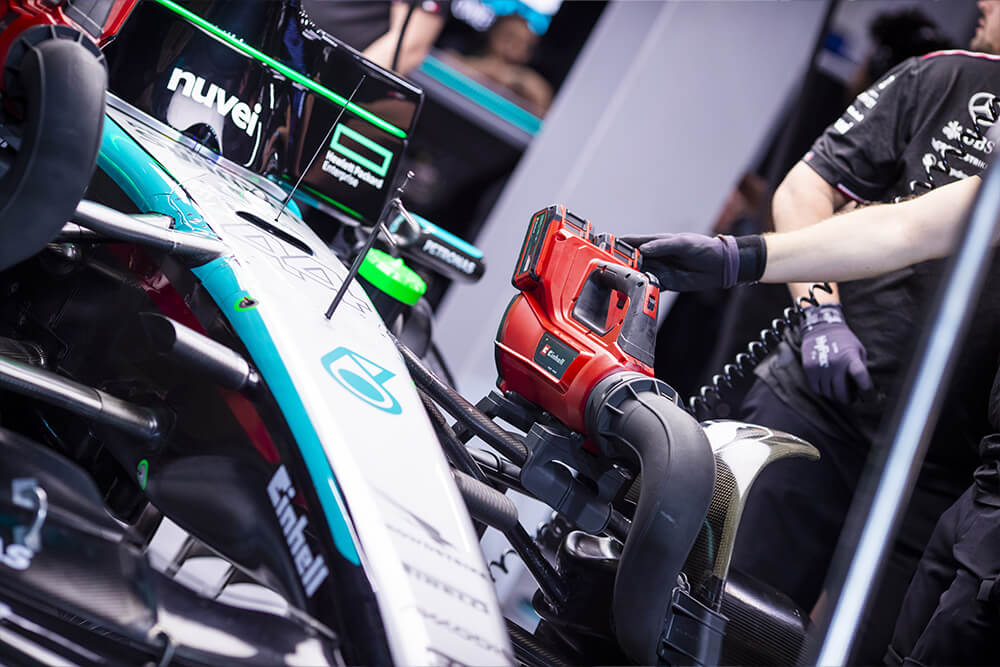 Formula 1 Mercedes car with an Einhell device.