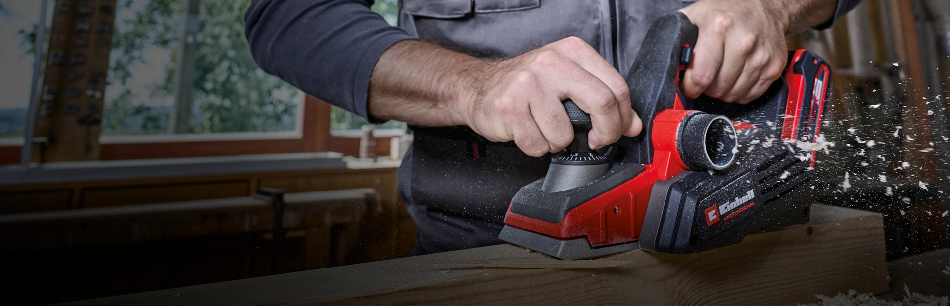 A man using a Power-X-Change sander